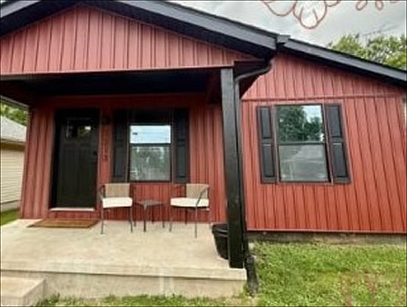 Covered front porch of one of the furnished homes
